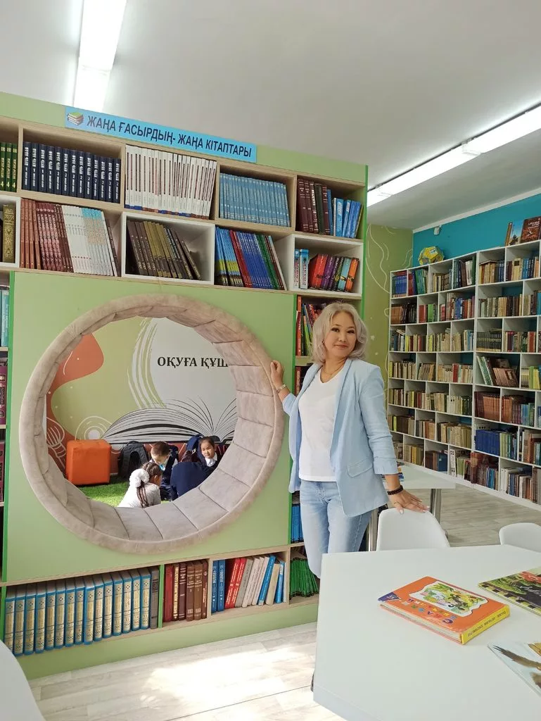 Author Madina Rakhimbayeva with her published books